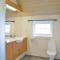 Foto: Seven-Bedroom Holiday Home in Harboore 25/26