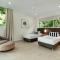 Pavillion 3 Absolute Waterfront 4 Bedroom 2 Lounge Room and Golf Buggy