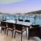 Pavillion 3 Absolute Waterfront 4 Bedroom 2 Lounge Room and Golf Buggy