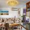 Elimia Suites & Studios