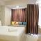 Artistic Studio Apartment at The Oasis Cikarang By Travelio