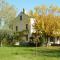 Casale Oliva in a landscape of oaks, olive e cherry trees