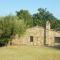 Casale Oliva in a landscape of oaks, olive e cherry trees