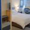 The Rushmore Hotel & Suites