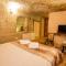 kayadibi cave hotel - 于尔居普
