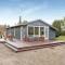 Foto: Three-Bedroom Holiday Home in Grenaa