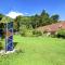 Cosy holiday home with gazebo on the edge of the forest