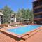 Spacious Condo with Outdoor Heated Pool and Hot Tubs
