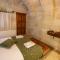 kayadibi cave hotel - 于尔居普