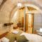 kayadibi cave hotel - 于尔居普