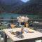 Royal Town Luxury with Panoramic View Wake up to breathtaking lake views and pure tranquility