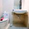 Cozy Studio Menteng Park Apartment By Travelio