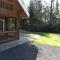 Foto: Atmospheric, wooden house with a dishwasher, in nature 6/22