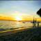 Madu Tiga Beach and Resort - 丹戎槟榔