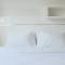 Modest 1BR Apartment at Parahyangan Residence By Travelio