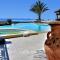 Amazing Luxury Villa, In Paphos, Extremely Large Pool. Jacuzzi, Gym, Games Room - 阿尔加卡