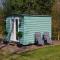 Hopgarden Glamping and camping - Luxury furnished Bell tents & Shepherd huts plus camp field to pitch your own tents