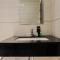 Simply and Relax 1BR at Brooklyn Alam Sutera Apartment By Travelio