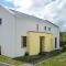 Foto: Cottages in Achill Sound Achill Island - EIR02100-FYA 5/26