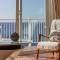Villa in protected space in front of the sea