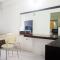 Pool View 2BR at Dian Regency Apartment By Travelio - 泗水