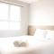 Classic 2BR Apartment At Gateway Pasteur near Exit Toll By Travelio
