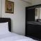 Minimalist 2BR Apartment at Gateway Ahmad Yani Cicadas By Travelio