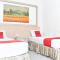 RedDoorz Plus near Sultan Hasanuddin Airport - Makasar