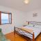 Apartments with parking space Brela, Makarska - 11552