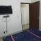 The Raveesh E24 - 2BHK Serviced Apartment