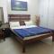 The Raveesh E24 - 2BHK Serviced Apartment