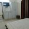 The Raveesh E24 - 2BHK Serviced Apartment