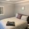 AB - Top floor 2 bed modern town centre apartment with parking for one vehicle