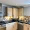 AB - Top floor 2 bed modern town centre apartment with parking for one vehicle