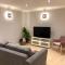 AB - Top floor 2 bed modern town centre apartment with parking for one vehicle