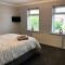AB - Top floor 2 bed modern town centre apartment with parking for one vehicle