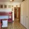 Villa del Golfo Urio with swimming pool shared by the two apartments