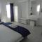 Blue and White Studios & Apartments