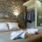 Petras Gi - Stone Houses