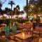 The White House with spa, bikes and steps to the beach and down town main street shops and dining