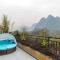 Foto: Lofty Mountains And Flowing Water Guesthouse 32/102