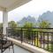 Foto: Lofty Mountains And Flowing Water Guesthouse 25/102