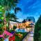Elmyra Villa, Heated Pool & Walking to beach, By ThinkVilla