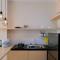 Comfortable Living 1BR at Asatti Apartment By Travelio