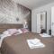 Villa Adria 2 luxury apartment with a pool