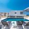 Villa Adria 2 luxury apartment with a pool