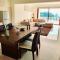JOANNA SUNSET APTS Pomos