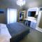 Suite mit Kingsize-Bett mit Whirlpool