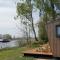 Foto: Duurzaam Tinyhouse aan het water in Friesland
