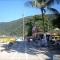 Foto: Sobrado de Alto Padrão com Piscina a 100mts da Praia no Guaruja 8/33